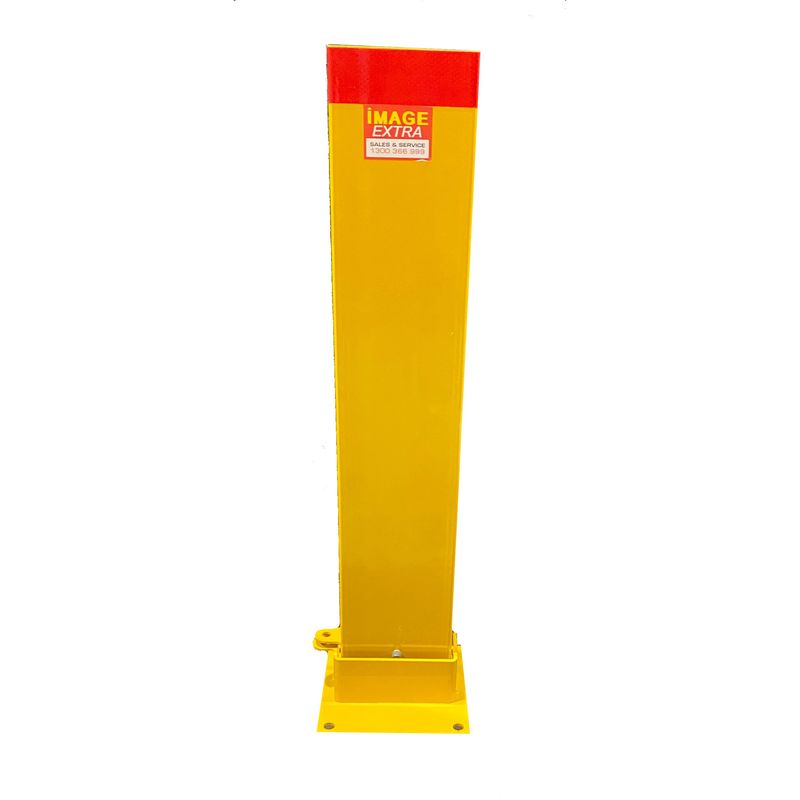 Yellow bollard post with a red top and a square base. The post has a sticker on the top portion with the words IMAGE EXTRA and a phone number.