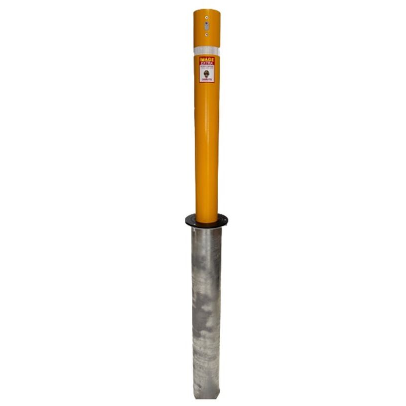 Yellow removable bollard with a silver metal sleeve. The bollard has a warning sign and two holes at the top. Security bollard for traffic control.