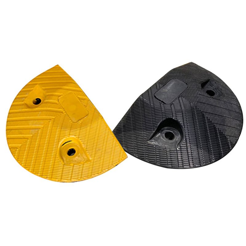smc250e Compliance Speed Hump End Per Pair - LLDPE- Black 11 Yellow and black rubber speed bump end caps. Traffic calming safety equipment for parking lots and roads.