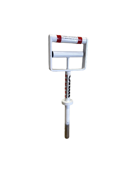 Close-up of an SPU KEY, a clutch key for OKAL bollards. White with red accents, T-shaped handle for operating bollard mechanisms.