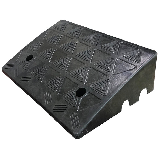 Kerb Ramp Image 1 Kerb Ramp Rubber 485mm x 425mm x 110mm - Black 8 Close-up of a black rubber kerb ramp, 485mm x 425mm x 110mm. The ramp has a textured surface with triangle patterns and mounting holes.