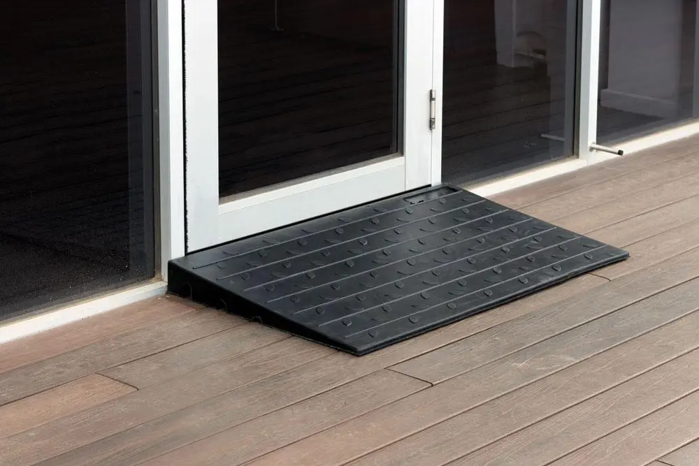 images products landing access ramp Access Ramp 609mm x 1070mm x 65mm - Black 2 Black access ramp, 609mm x 1070mm x 85mm, providing smooth transition over a doorway threshold. Mobility aid for easy wheelchair access.